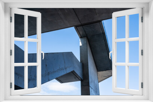 Fototapeta Naklejka Na Ścianę Okno 3D - Concrete stairs going up to a bridge.