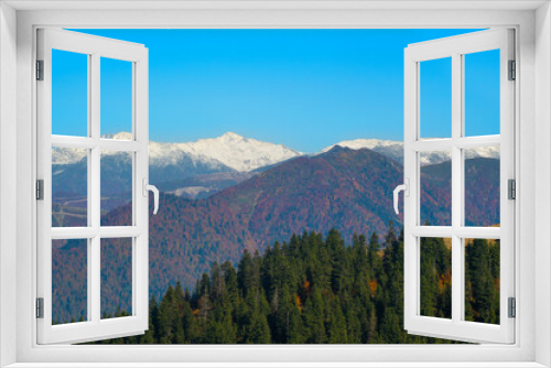 Foggy and snowy mountain landscape. Mountains covered with fog and clouds. Snow-capped hills. Snow-covered forest landscape. Black Sea mountains. Pokut Plateau. Kackar Mountains. Rize, Türkiye.