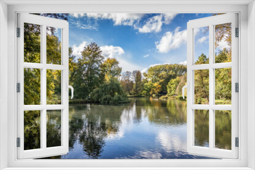 Fototapeta Naklejka Na Ścianę Okno 3D - Autumn in the park. Beautiful autumn landscape with reflection of trees in the lake of national forest Rivierenhof, Antwerp, Belgium.