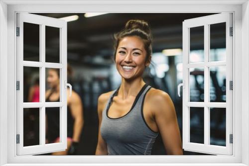 satisfied girl in her 30s doing a kickboxing class in a gym