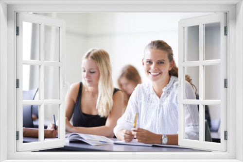 College student, portrait and learning with notes in class, lecture or people in education. University, classroom and face of happy woman with notebook, knowledge and studying in academy or school