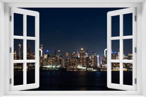 Fototapeta Naklejka Na Ścianę Okno 3D - New York west side and panoramic view on office buildings at night