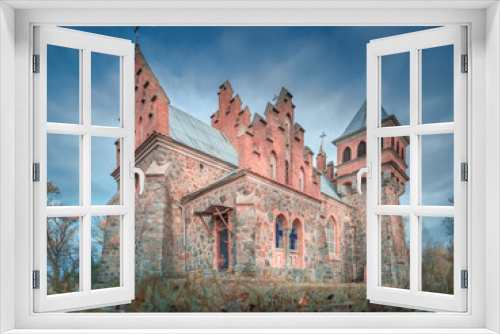 Fototapeta Naklejka Na Ścianę Okno 3D - view from low point to facade of old cathedral under dramatic sky in Ukraine