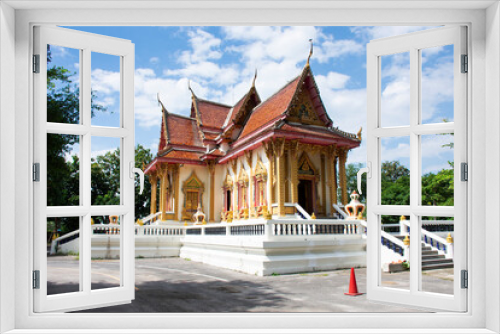 Fototapeta Naklejka Na Ścianę Okno 3D - Ancient ubosot ordination hall and antique church chapel for thai people travel visit respect praying blessing buddha with holy mystery myth at Wat Tham Nam or Water Cave Temple in Ratchaburi Thailand