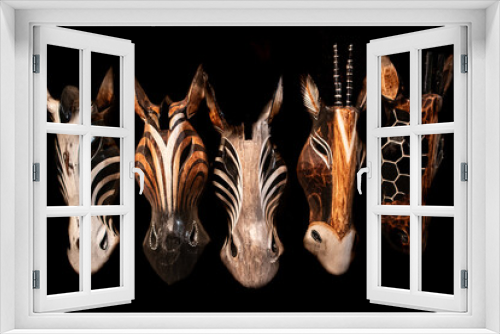Fototapeta Naklejka Na Ścianę Okno 3D - Wooden animal masks with black background