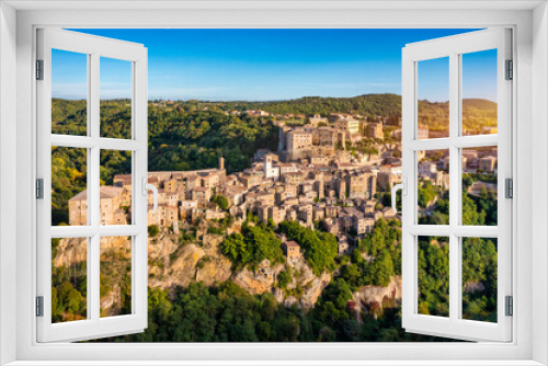 Fototapeta Naklejka Na Ścianę Okno 3D - Medieval Pitigliano town over tuff rocks in province of Grosseto, Tuscany, Italy. Pitigliano is a small medieval town in southern Tuscany, Italy.