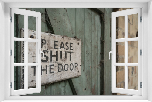 Fototapeta Naklejka Na Ścianę Okno 3D - Keep door closed sign in an abandoned building.