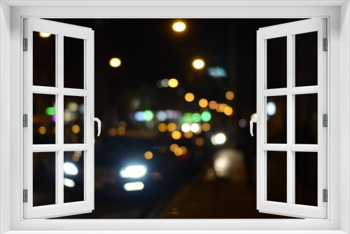 Fototapeta Naklejka Na Ścianę Okno 3D - Blurred view of night city street