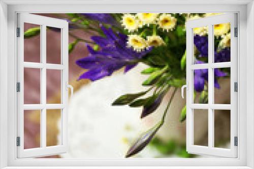 Fototapeta Naklejka Na Ścianę Okno 3D - Beautiful wild flowers on table