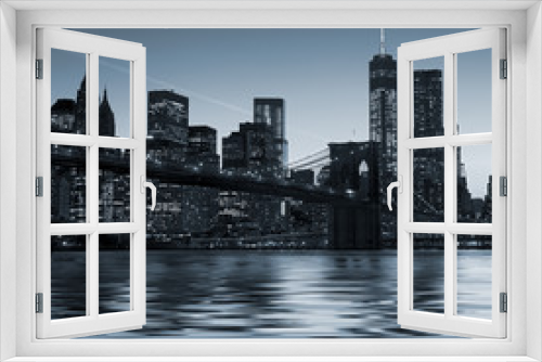 Fototapeta Naklejka Na Ścianę Okno 3D - Panoramic view New York City Manhattan downtown skyline at night