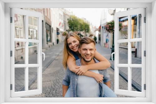 Netherlands, Maastricht, portrait of happy young couple in the city