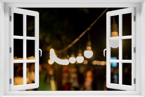 Fototapeta Naklejka Na Ścianę Okno 3D - Decorative Light bulb hanging outdoor. 