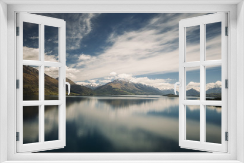 Fototapeta Naklejka Na Ścianę Okno 3D - Reflection of the mountain range on Lake Wakatipu, New Zealand