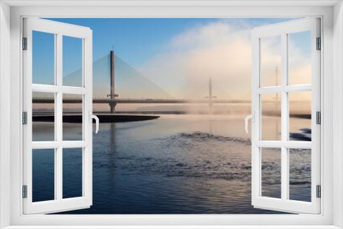 Fototapeta Naklejka Na Ścianę Okno 3D - Cable-Stayed River Crossing Mersey Gateway Bridge in winter with fog