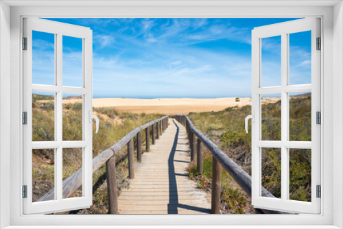 Fototapeta Naklejka Na Ścianę Okno 3D - wooden boardwalk to the sandy beach, tourist resort Carrapateira Portugal