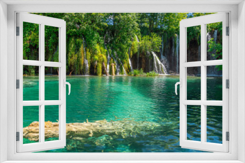 Fototapeta Naklejka Na Ścianę Okno 3D - Picturesque waterfall. Waterfall among rocks and forest. Plitvice Lakes, Croatia.