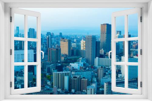 Fototapeta Naklejka Na Ścianę Okno 3D - A dawn panoramic cityscape in Osaka
