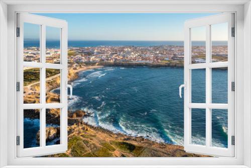 Fototapeta Naklejka Na Ścianę Okno 3D - Drone view of waves in small bay by town of Peniche, Portugal