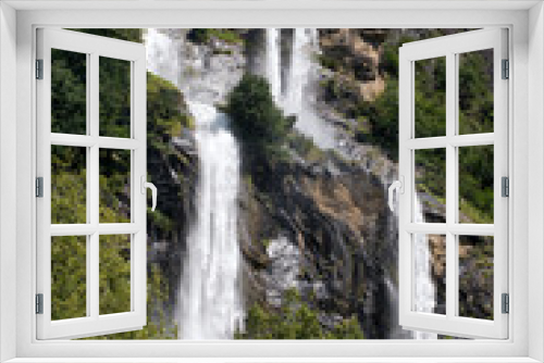 Fototapeta Naklejka Na Ścianę Okno 3D - Twin waterfall cascading down a mountainside