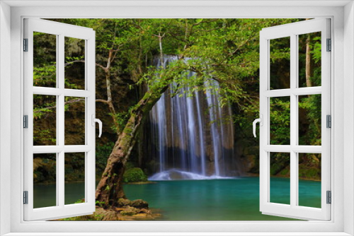 Fototapeta Naklejka Na Ścianę Okno 3D - Erawan Waterfall is located in Erawan National Park. A 7-tiered waterfall for each level can go into the water. It is very famous, large and beautiful. 
Kanchanaburi province,Thailand