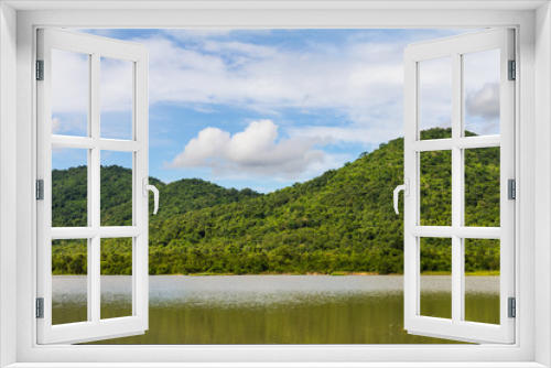 Fototapeta Naklejka Na Ścianę Okno 3D - View of mountains in a lake of Thailand, which has a green tree.