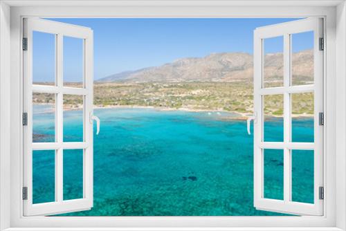 Fototapeta Naklejka Na Ścianę Okno 3D - The sandy beach and its heavenly colored water, in Europe, Greece, Crete, Elafonisi, By the Mediterranean Sea, in summer, on a sunny day.