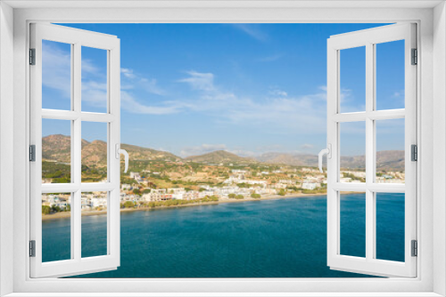 Fototapeta Naklejka Na Ścianę Okno 3D - The paradise coast and the sandy beach at the foot of the mountains, in Europe, Greece, Crete, Analipsi, By the Mediterranean Sea, in summer, on a sunny day.