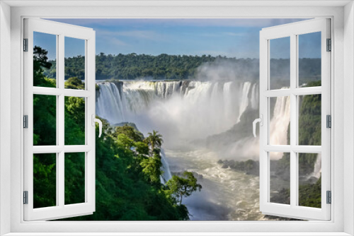 Fototapeta Naklejka Na Ścianę Okno 3D - Water cascading over multiple falls at the Iguacu falls in Brazil