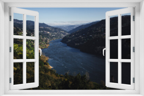 Fototapeta Naklejka Na Ścianę Okno 3D - A view of the Douro River in the Douro Valley in late fall. Portugal.