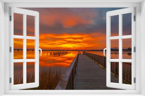 Fototapeta Naklejka Na Ścianę Okno 3D - Glorious sunrise at Phoebus Pier