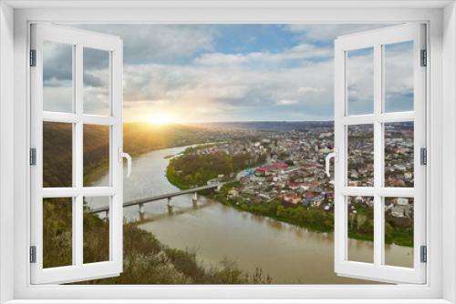 Fototapeta Naklejka Na Ścianę Okno 3D - The Dniester River and the city of Zalishchyky, aerial view, a beautiful landscape of the city surrounded by a river, in the form of a horseshoe.