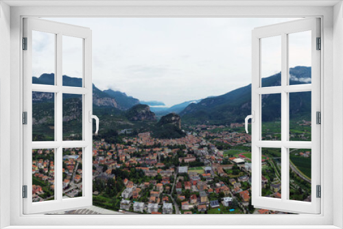 Fototapeta Naklejka Na Ścianę Okno 3D - Aerial view of Arco village and his Arco castle on high rock view, Sarca Valley, Trentino Alto Adige region of Italy . Arco, Trento, Italy