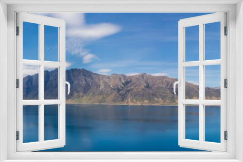 Fototapeta Naklejka Na Ścianę Okno 3D - the panorama view of lake Hawea.  It is in the Otago Region New Zealand,  at an altitude of 348 metres. It covers 141 km² and reaches 392 metres deep.