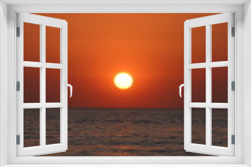 Fototapeta Naklejka Na Ścianę Okno 3D -  orange sunset over the green sea