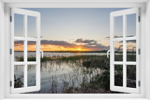 Fototapeta Naklejka Na Ścianę Okno 3D - Sunset at the lake.
