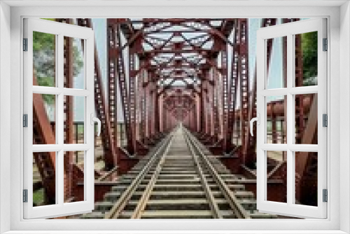 Fototapeta Naklejka Na Ścianę Okno 3D - The Chak-Nizam Bridge, also known as the Victoria Railway Bridge, was completed in early 1887 over the Jehlum river near Malakwal.