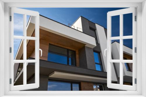 Fototapeta Naklejka Na Ścianę Okno 3D - Contemporary Residential Building Exterior in the Daylight