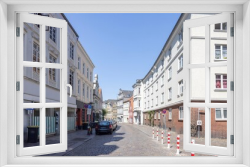 Fototapeta Naklejka Na Ścianę Okno 3D - Walking in Flensburg's streets along the sea side, Germany
