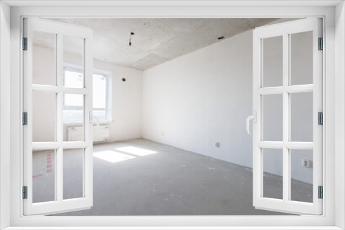 interior of the apartment without decoration in gray colors. rough finish