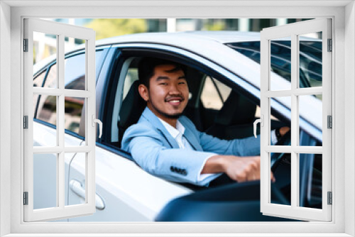 a happy stylish asian man in light blue suit is driving white car, Sale transport concept.