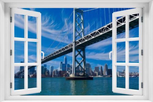 Fototapeta Naklejka Na Ścianę Okno 3D - Daytime View of Bay Bridge and San Francisco Skyline Under Cirrus Clouds