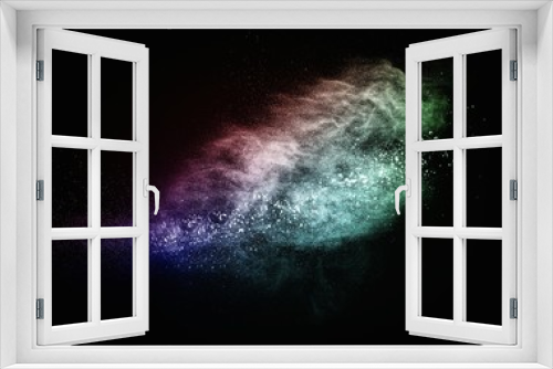 Fototapeta Naklejka Na Ścianę Okno 3D - Colourful powder exploding isolated on black