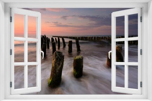 Fototapeta Naklejka Na Ścianę Okno 3D - Morze Bałtyckie, falochron, zachód słońca,fale morskie, Kołobrzeg, Polska