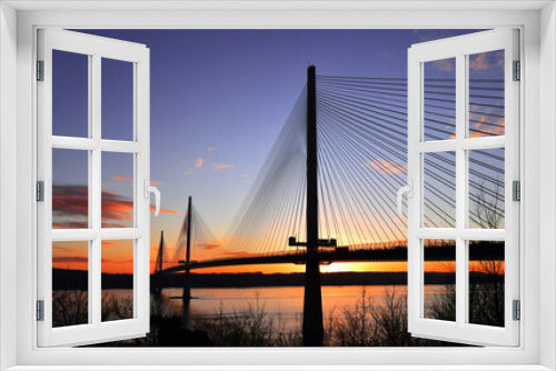 Fototapeta Naklejka Na Ścianę Okno 3D - Bridge at sunset with sun behind