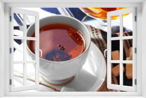 Fototapeta Naklejka Na Ścianę Okno 3D - Cup of tea on table, close up