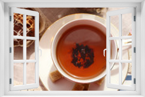 Fototapeta Naklejka Na Ścianę Okno 3D - Cup of tea on table, close up