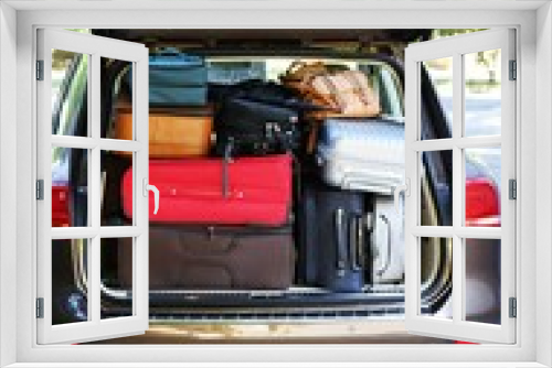 Fototapeta Naklejka Na Ścianę Okno 3D - Suitcases and bags in trunk of car ready to depart for holidays