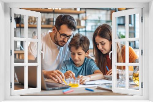 A family at home with a laptop, parents helping their son with his science homework