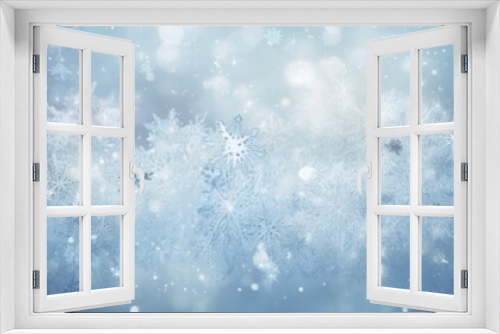 Abstract winter background with white snow crystals.