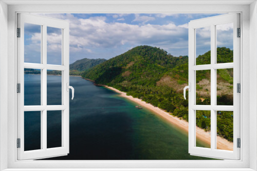 Fototapeta Naklejka Na Ścianę Okno 3D - A beautiful view of a calm beach with crystal clear water on the blue sky at Koh Libong, Trang province, Thailand, Andaman Sea.